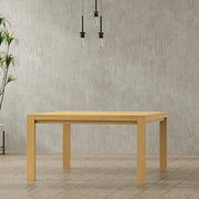 Wilson handcrafted dining table by Simpli-Home featuring a spacious wooden surface and sturdy legs, ideal for family meals.