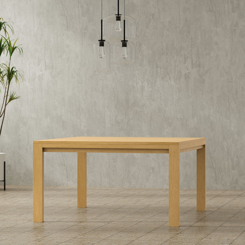 Wilson handcrafted dining table by Simpli-Home featuring a spacious wooden surface and sturdy legs, ideal for family meals.