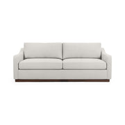 Classic Home Aspen stationary sofa with plush cushions and elegant design, shown in a cozy living room setting.