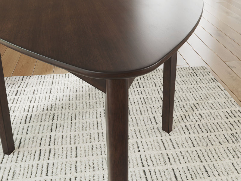 Mallenette - Triangle Dining Room Table - Merlot - R&R Furniture Gallery (Fountain Valley, CA)