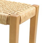 Noble House Angie outdoor bench with acacia wood frame and faux rattan seating, featuring teak finish and sturdy design.