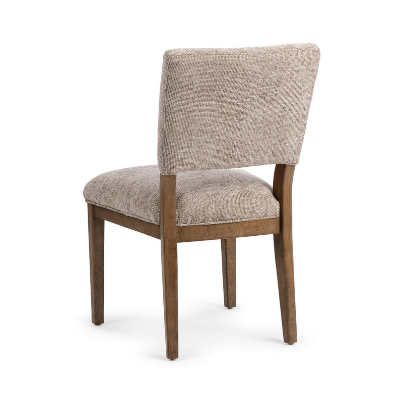 Pair of Classic Home Arima dining chairs in a set, featuring wooden legs and upholstered seats for a stylish dining room look.