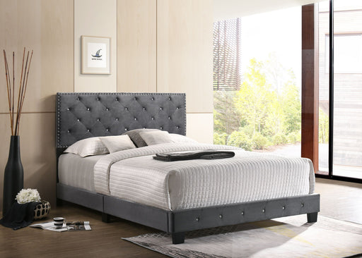 Luxurious upholstered bed by Glory Furniture featuring plush fabric and a stylish headboard in a modern bedroom setting.