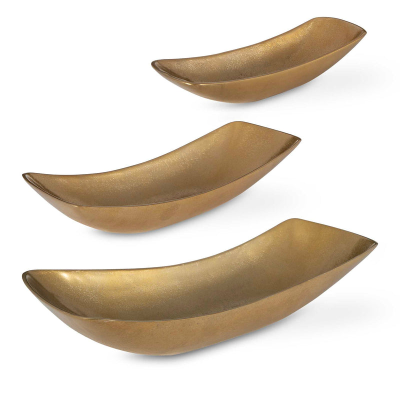 Set of three Uttermost Anas bowls in antique brass with elegant, rounded design for decorative or functional use.