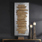 Gold metal wall decor by Uttermost featuring a modern, abstract design perfect for contemporary interior accents.
