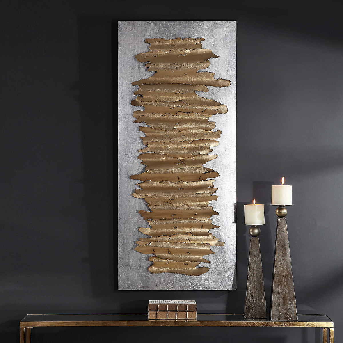 Gold metal wall decor by Uttermost featuring a modern, abstract design perfect for contemporary interior accents.