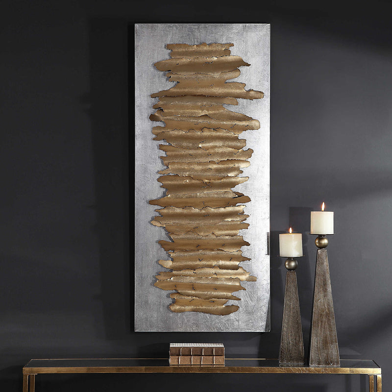 Gold metal wall decor by Uttermost featuring a modern, abstract design perfect for contemporary interior accents.