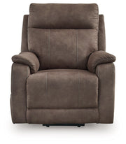 Crestmeade Power Lift Recliner by Signature Design Ashley, showing a plush beige lift chair with padded armrests and a reclining back.