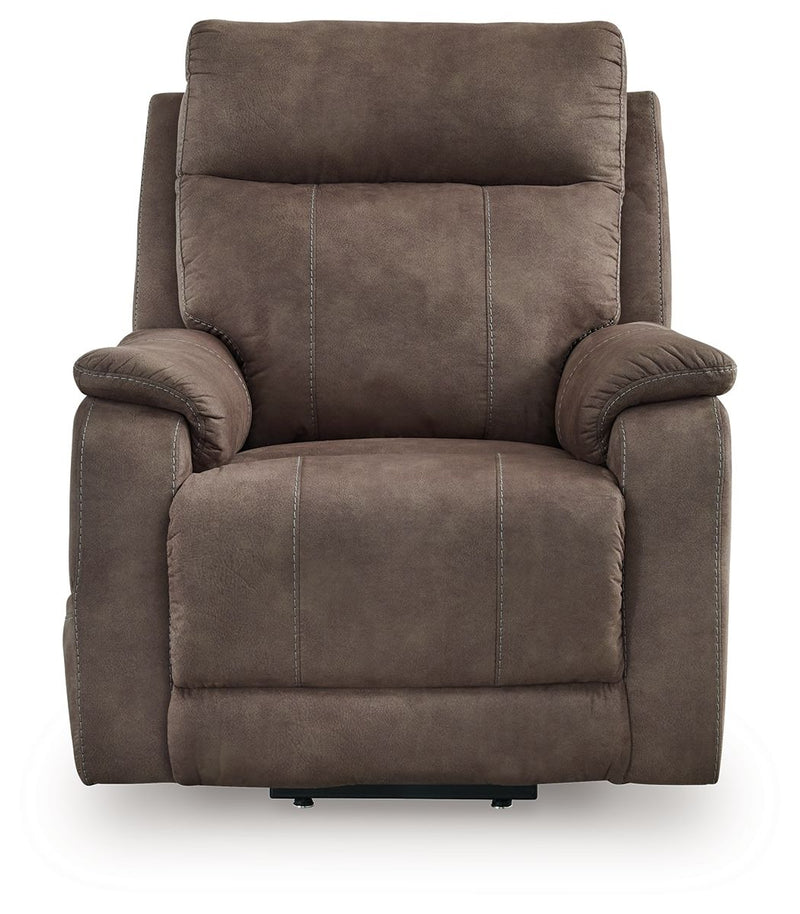 Crestmeade Power Lift Recliner by Signature Design Ashley, showing a plush beige lift chair with padded armrests and a reclining back.