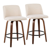 Lumi Source Toriano mid-century modern counter stool set of 2 with wooden legs and upholstered seats on dark wood flooring.