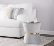 Lumi Source Gemma silver and gold contemporary glam ottoman with a sleek, rounded design and plush upholstery.