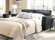 Signature Design by Ashley Altari sleeper sofa with plush upholstery and convertible design, perfect for versatile living spaces.