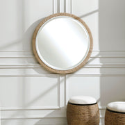 Light brown Carbet round rope mirror by Uttermost, wall-mounted with a natural woven rope frame for stylish decor.