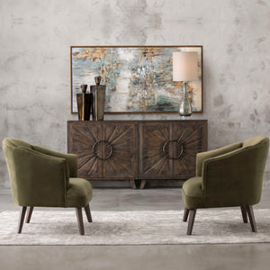 Uttermost Conroy accent chair in olive upholstery with sleek wooden legs, stylish and comfortable for living room decor.