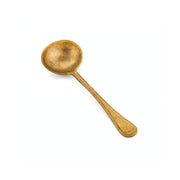 Large brass serving spoon from TOV Furniture's Anuja flatware set, featuring a sleek, polished design and ergonomic handle.
