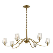 Uttermost Barcelona 6-light brass chandelier with gold finish, featuring elegant design and multiple light bulbs for a stylish ambiance.