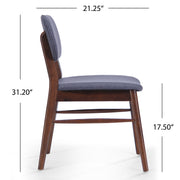 Pair of upholstered comfort dining chairs by Noble House, featuring plush cushioning and stylish fabric upholstery.