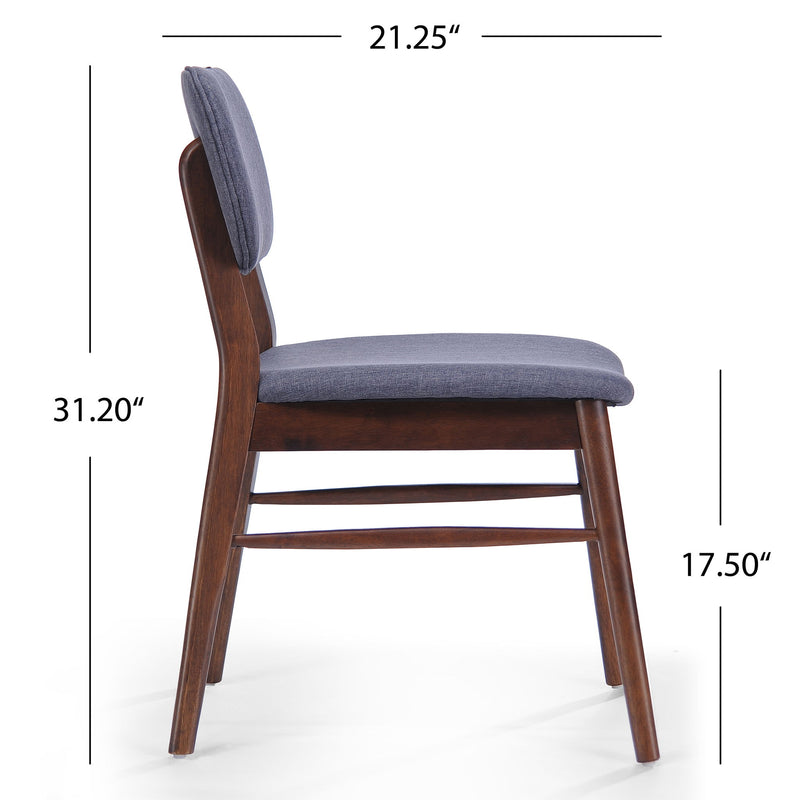 Pair of upholstered comfort dining chairs by Noble House, featuring plush cushioning and stylish fabric upholstery.