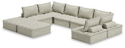 Signature Design by Ashley stationary sectional with plush beige fabric and wide armrests, perfect for modern living rooms.