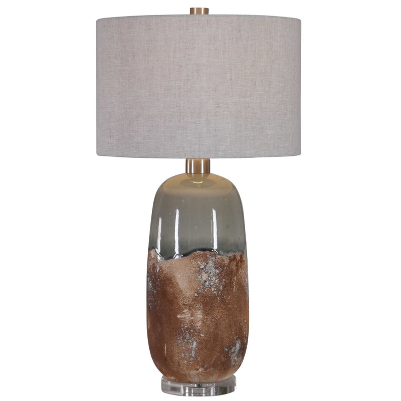 Uttermost Maggie ceramic table lamp in light brown with a rounded base and fabric shade, perfect for bedside or living room decor.