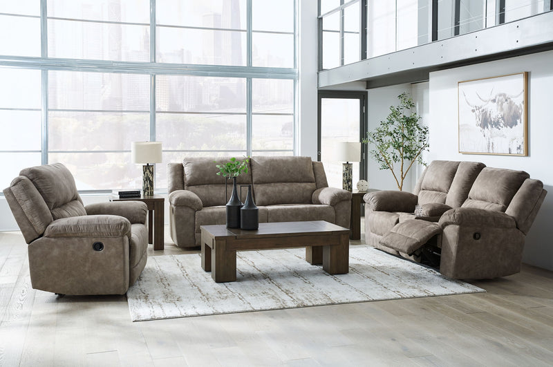 Signature Design by Ashley Laresview reclining sofa and loveseat set in a modern living room setup with plush upholstery and comfortable design.