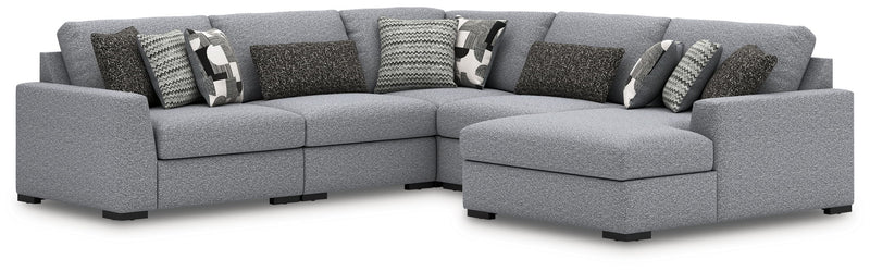 Benchcraft Bealton stationary sectional sofa with plush cushions and modern design, shown in a cozy living room setting.