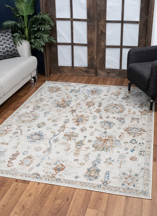 Noble - 5'3" X 7'3" Area Rug - Ivory - R&R Furniture Gallery (Fountain Valley, CA)