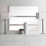Set of three gold wall mirrors by Uttermost, featuring elegant, round frames with a modern design for stylish home decor.