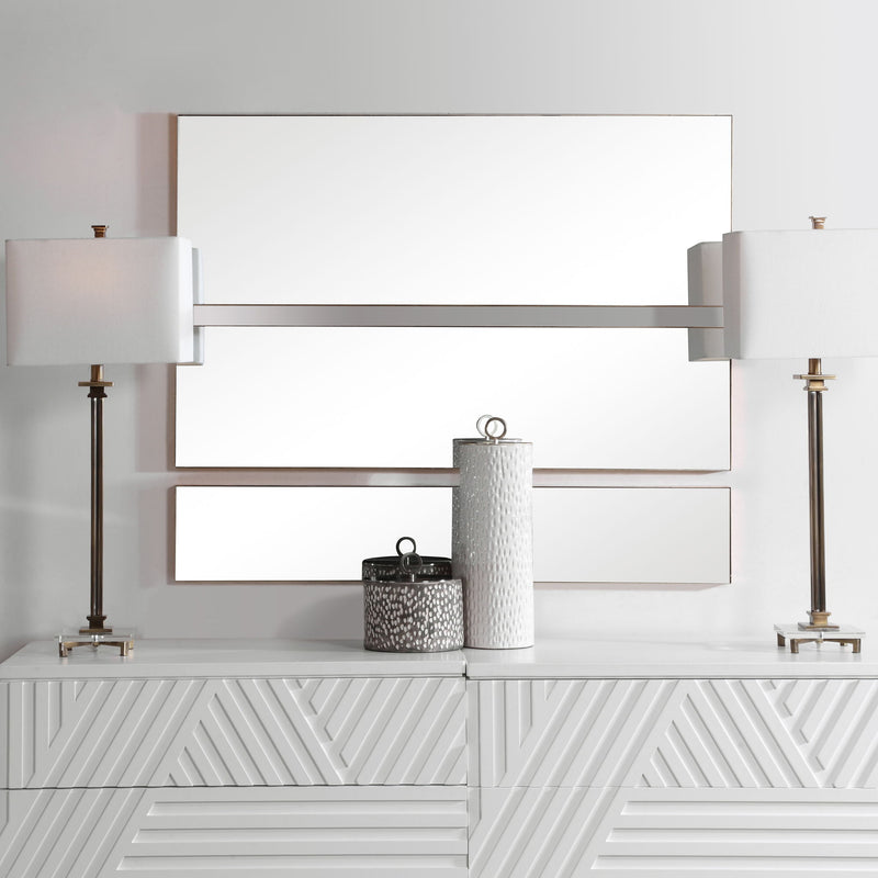 Set of three gold wall mirrors by Uttermost, featuring elegant, round frames with a modern design for stylish home decor.