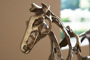 Antique gold finish Grainville sculpture from Signature Design by Ashley, featuring intricate detailing in a decorative figurine.