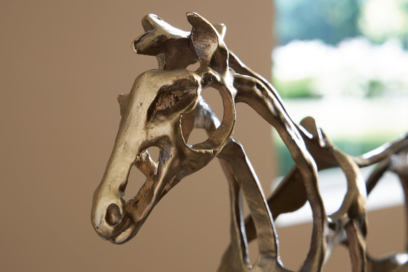 Antique gold finish Grainville sculpture from Signature Design by Ashley, featuring intricate detailing in a decorative figurine.