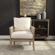 Uttermost Encore natural armchair with white upholstery, showcasing a stylish and comfortable arm chair design.