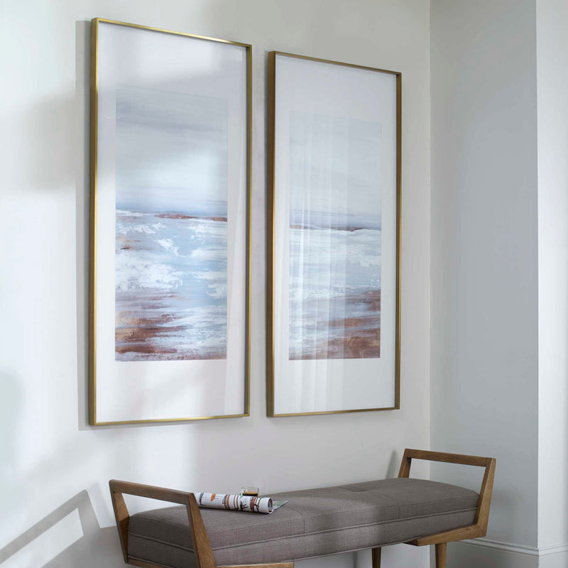 Set of two Uttermost Coastline framed prints in light brown with coastal landscape artwork, ideal for wall decor.