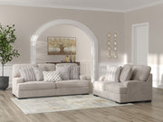 Benchcraft® high profile living room set featuring stationary sofas and loveseats with plush upholstery and modern design.