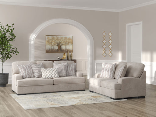 Benchcraft® high profile living room set featuring stationary sofas and loveseats with plush upholstery and modern design.