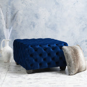 Noble House modern glam upholstered ottoman with button tufted design, soft fabric and stylish decor accents.
