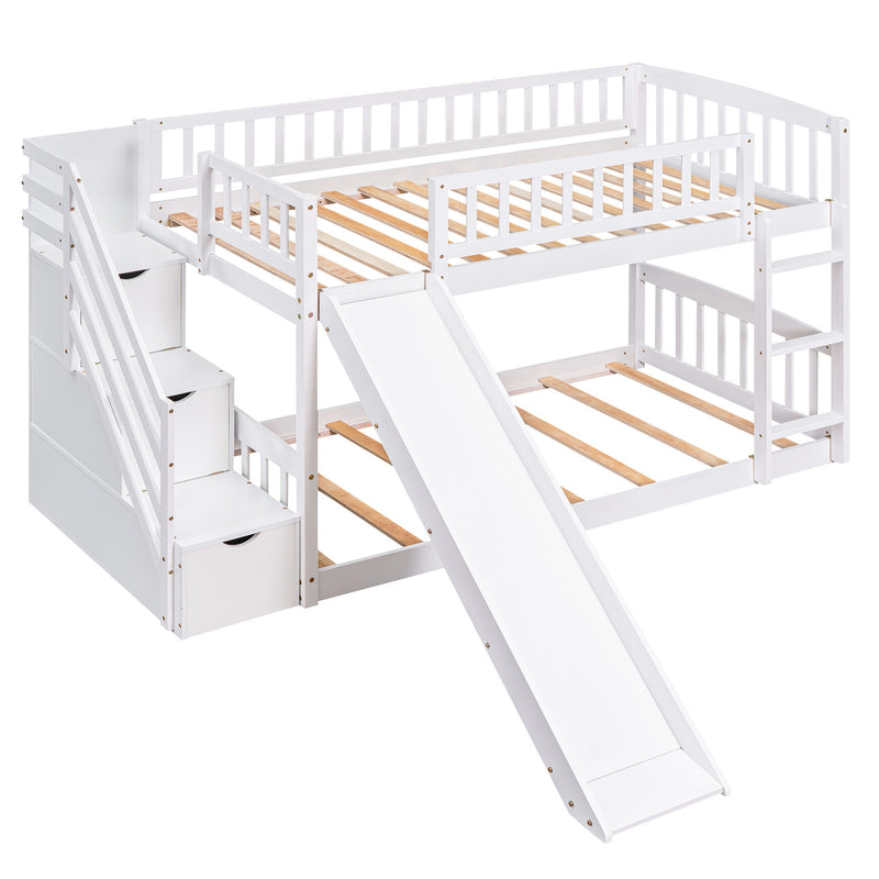 DreamHaus twin over twin stairway bunk bed with two drawers and slide, showcasing the sturdy wooden frame and built-in storage.