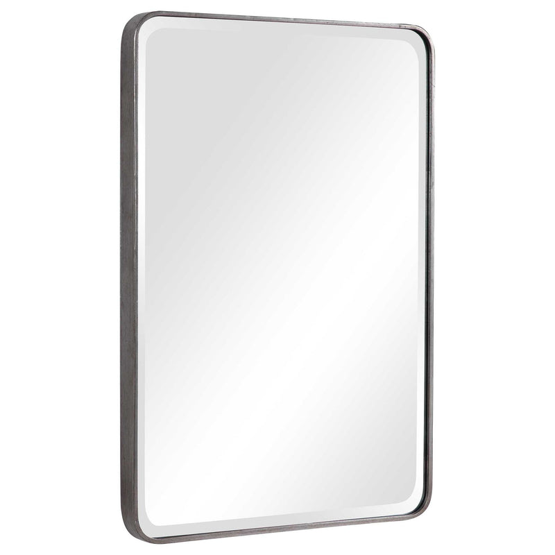 Uttermost Aramis silver wall mirror with a sleek, modern rectangular frame hanging on a wall.