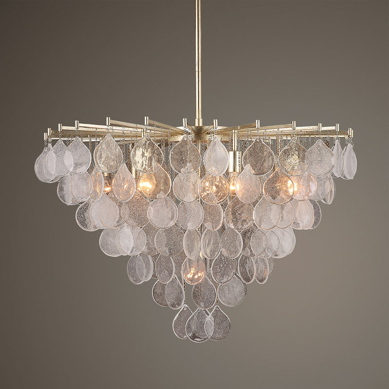 Uttermost Goccia Tear Drop Glass Pendant light hanging with a sleek glass teardrop shape and modern pendant lighting design.
