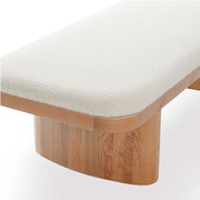 Upholstered Ollie Bench by TOV Furniture featuring a sleek, modern design with plush cushioning and wooden legs.