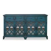 Oksana wooden credenza by Uttermost with a green finish, featuring sleek design and natural wood grain details.