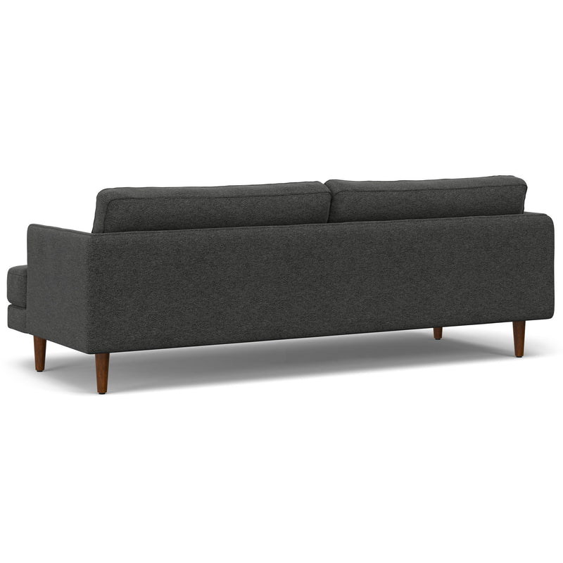 Livingston upholstered stationary sofa by Simpli-Home with plush cushions and fabric upholstery in a cozy living room setting.