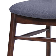 Set of two upholstered Noble House comfort dining chairs with padded seats and high backrests, ideal for modern dining rooms.