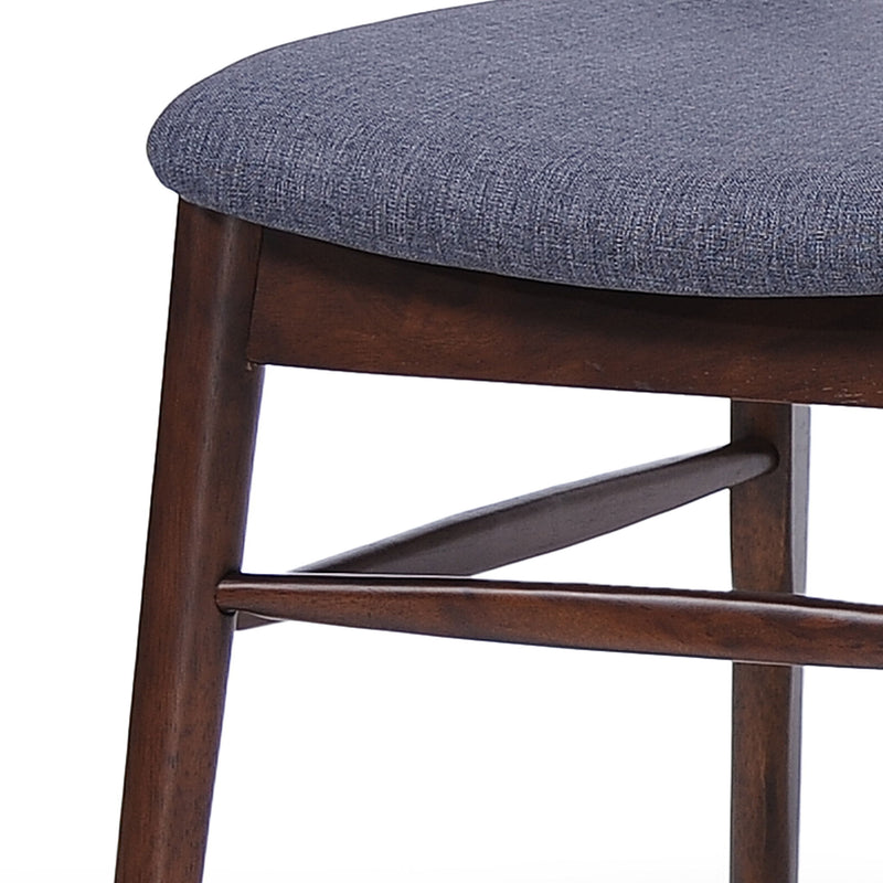 Set of two upholstered Noble House comfort dining chairs with padded seats and high backrests, ideal for modern dining rooms.