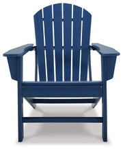 Outdoor Adirondack chair from the Sundown Treasure collection by Signature Design by Ashley, featuring a wooden armchair with a slatted back.