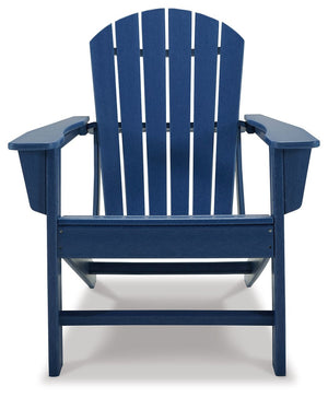 Outdoor Adirondack chair from the Sundown Treasure collection by Signature Design by Ashley, featuring a wooden armchair with a slatted back.