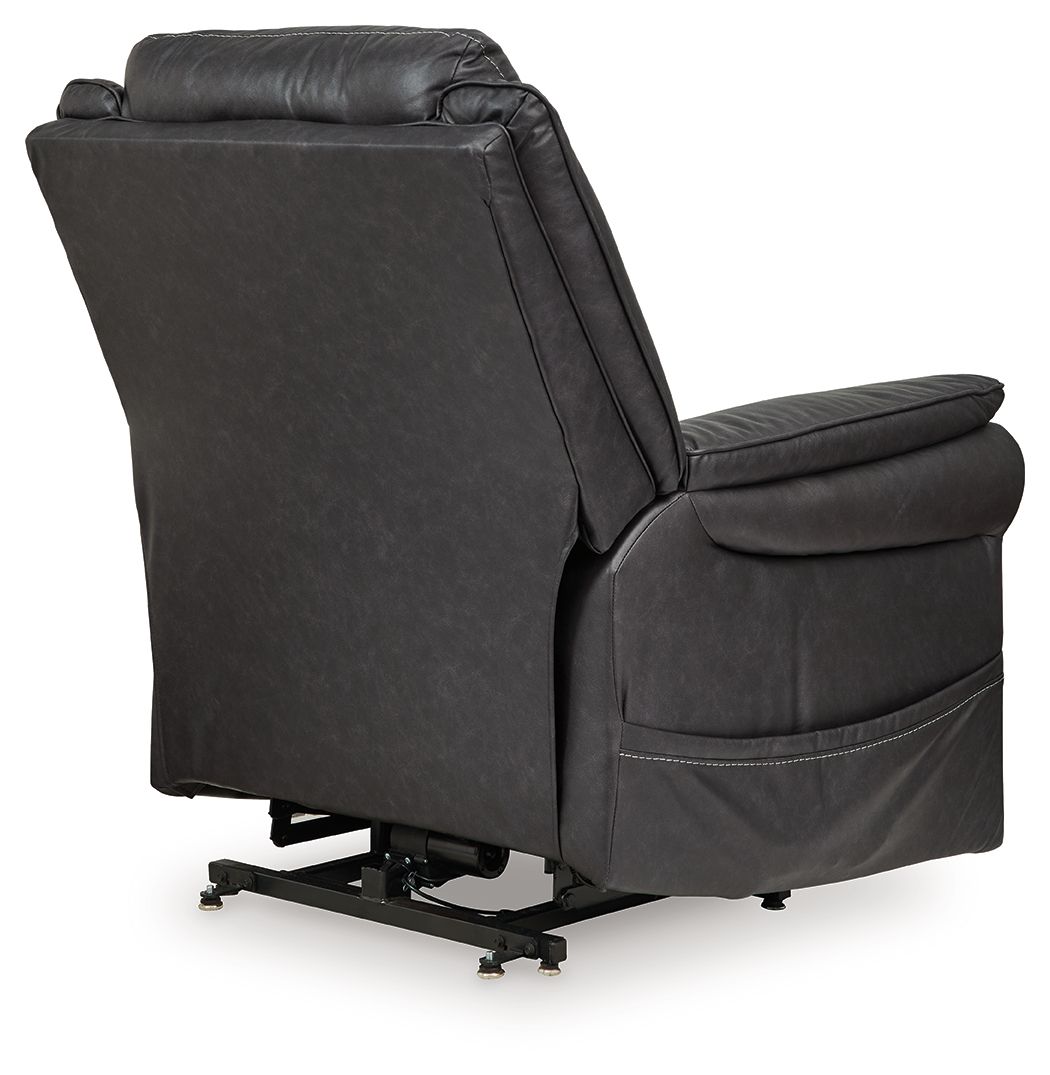 Signature Design by Ashley Oatman Power Lift Recliner in plush fabric, showing the reclined chair with armrests and control panel.