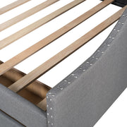 DreamHaus upholstered storage daybed with two drawers and wood slat support, showcasing soft fabric upholstery and sturdy frame.