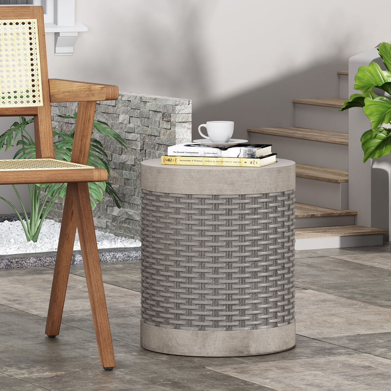 Round concrete outdoor end table by Noble House, lightweight and natural finish, perfect for patio or garden seating areas.