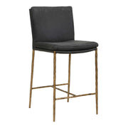 Uttermost Ascend counter stool with a sleek wooden seat and metal frame, designed for counter height seating (24-27 inches).